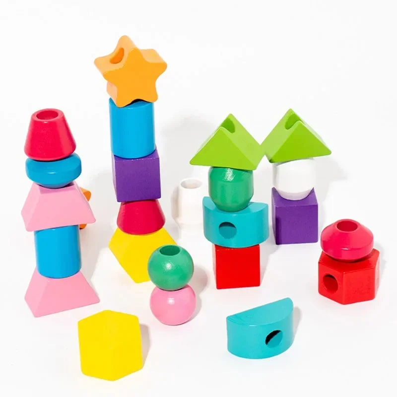 Colorful geometric shape building blocks on a white background