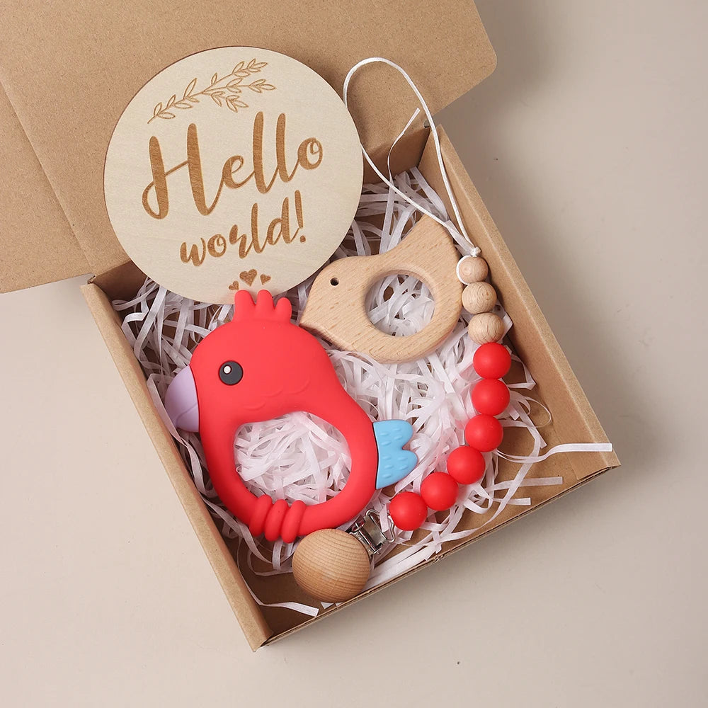 Baby teething toy set with 'Hello world!' sign in a box