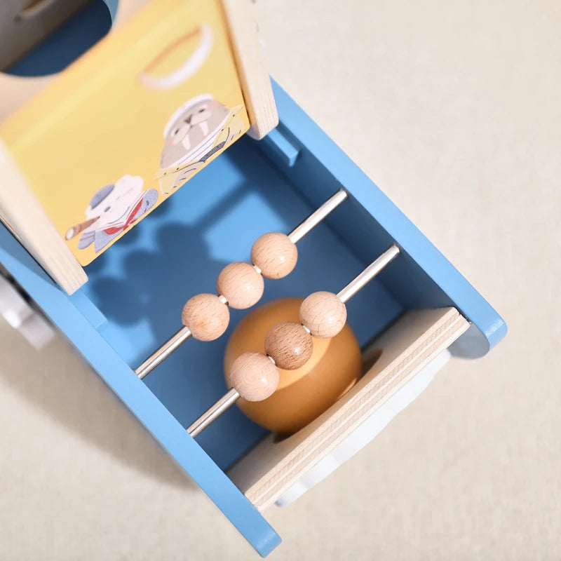 Wooden abacus toy with a blue frame on a light gray background