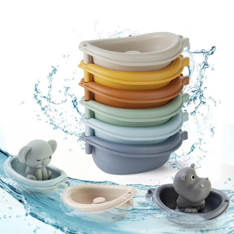 Stack of colorful silicone toyswith cartoon animal characters on a water-themed background