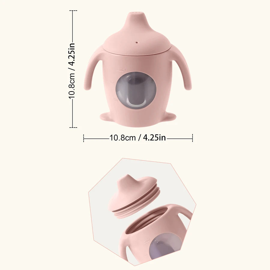 Pink sippy cup with measurements on a white background