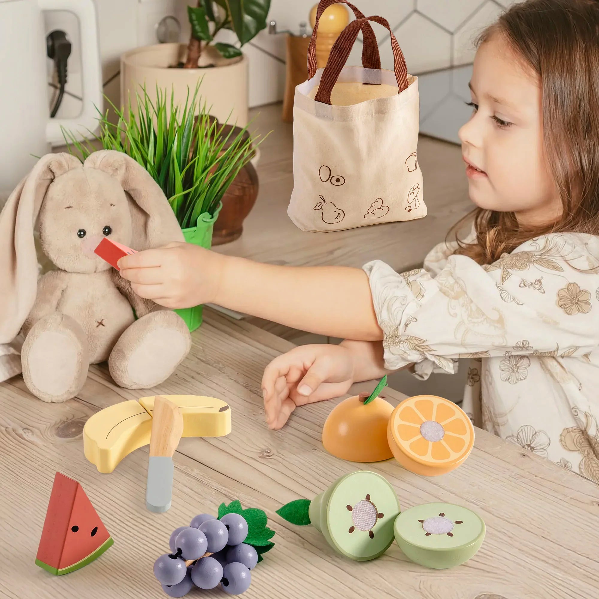 Child playing with wooden toys on a table, including fruits and a teddy bear.