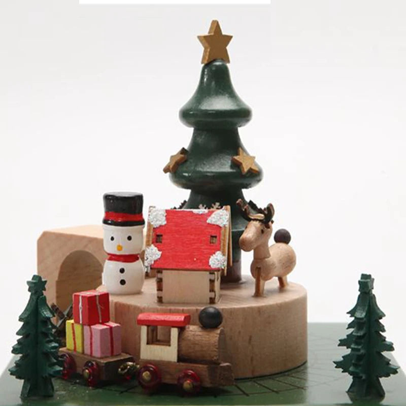 Wooden Christmas scene with tree, house, reindeer, and snowman on a white background