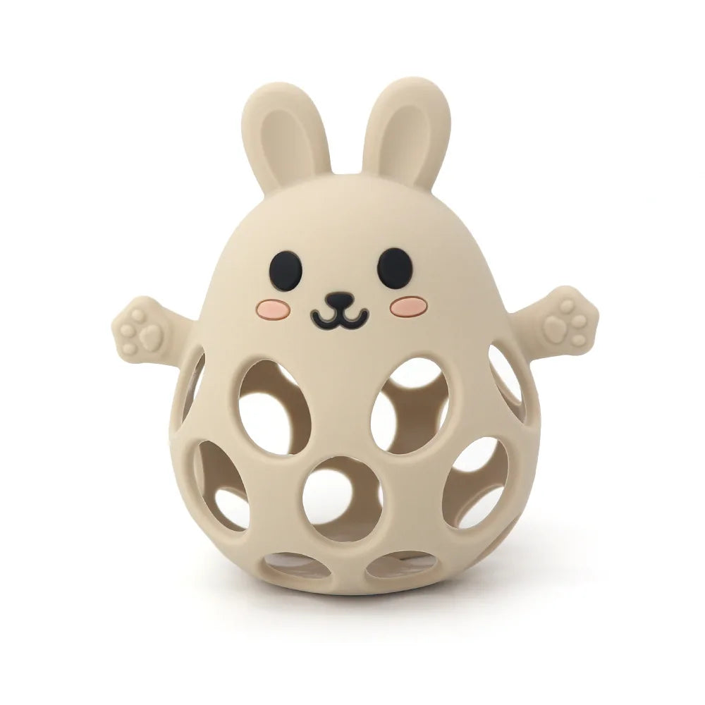 Beige rabbit-shaped toy with holes on a white background