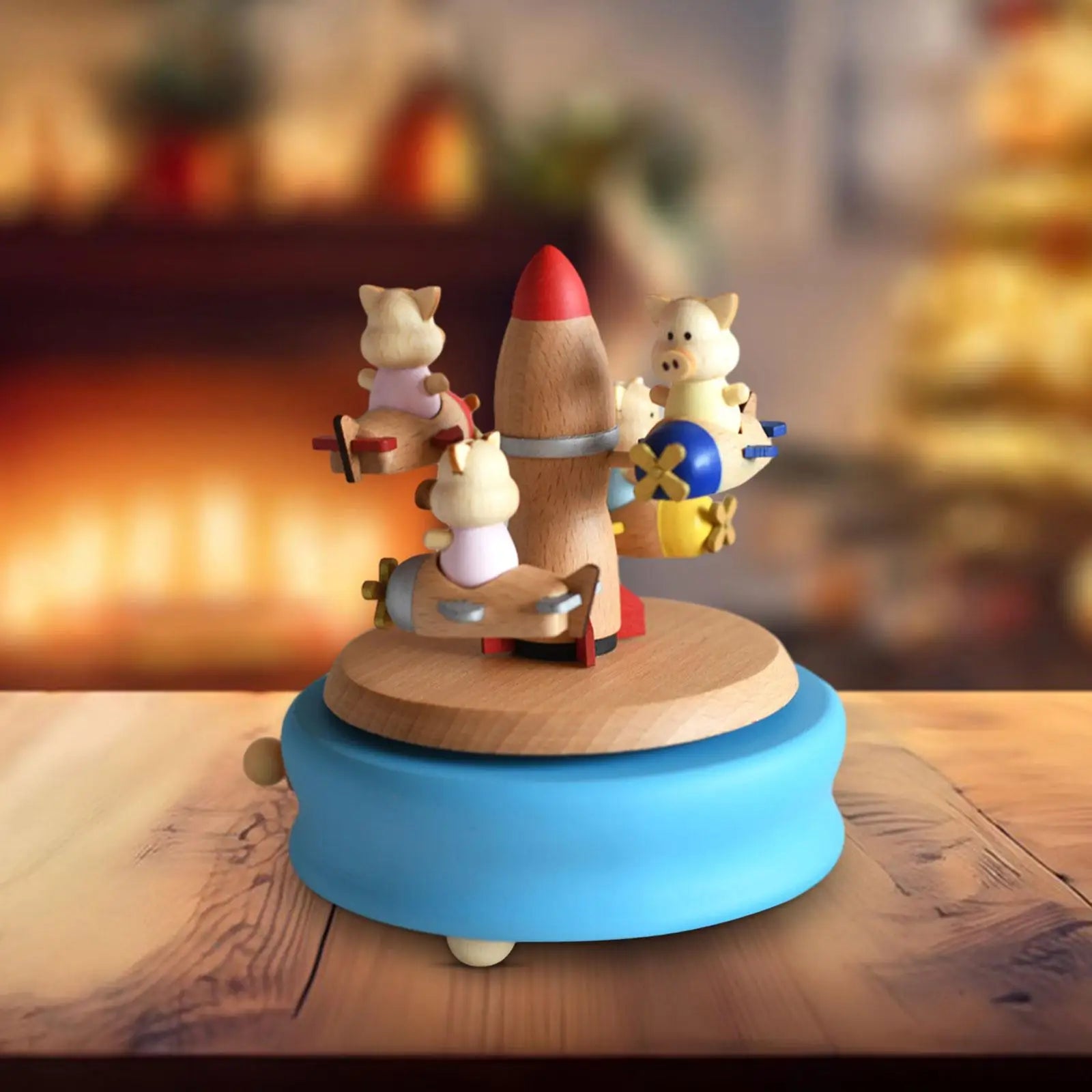 Wooden toy with rocket and animal figures on a blue base, blurred  | Oliver & Company Montessori Toys