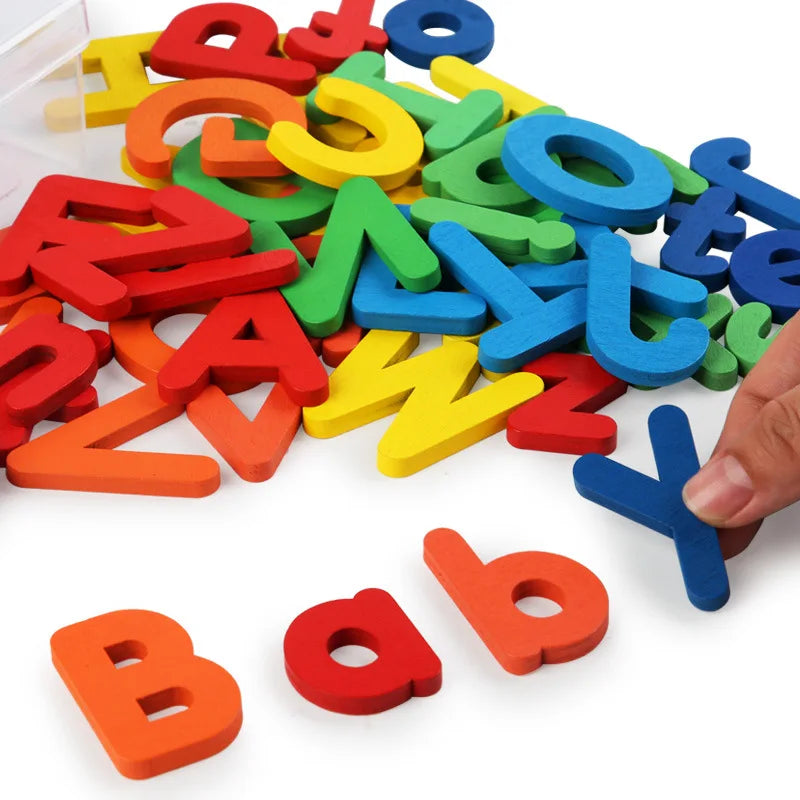 Colorful wooden letters on a white background with a hand placing a blue letter 'Y'.