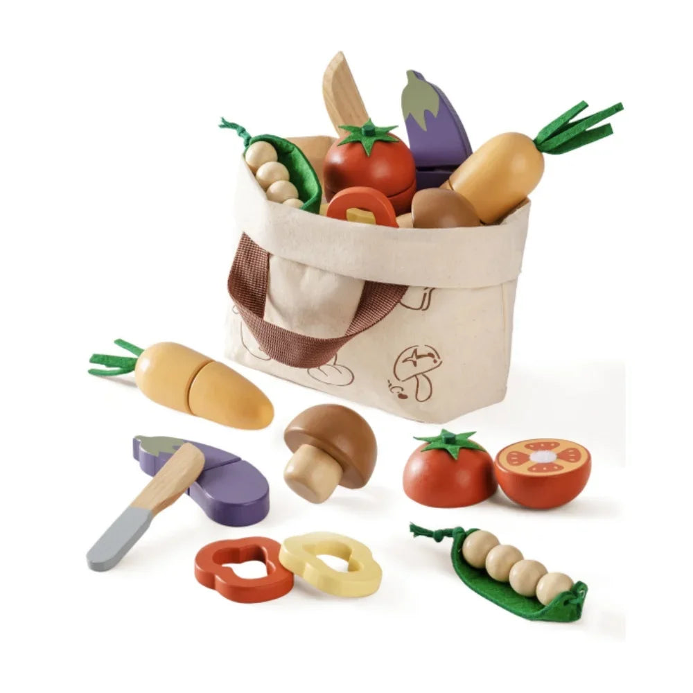 Set of toy vegetables and a bag on a white background