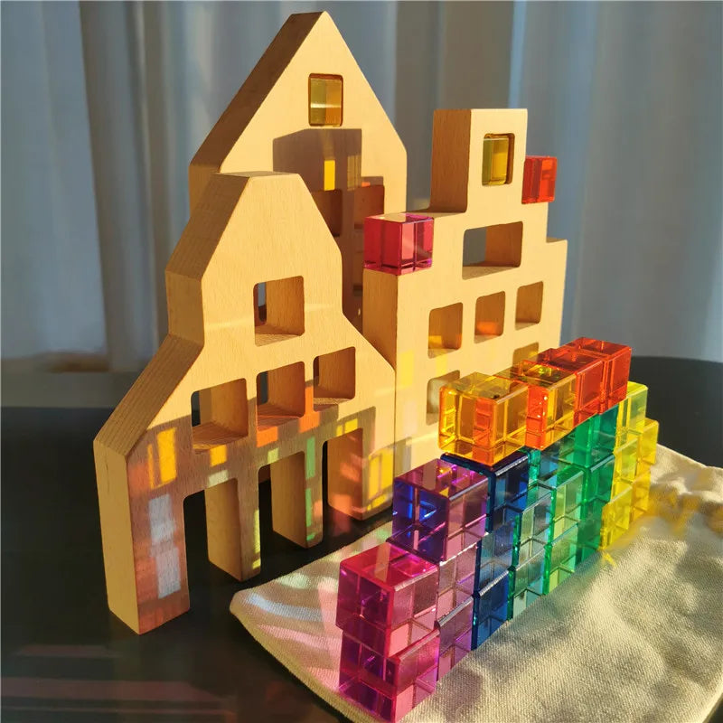 Wooden buildings with colorful transparent blocks on a textured surface