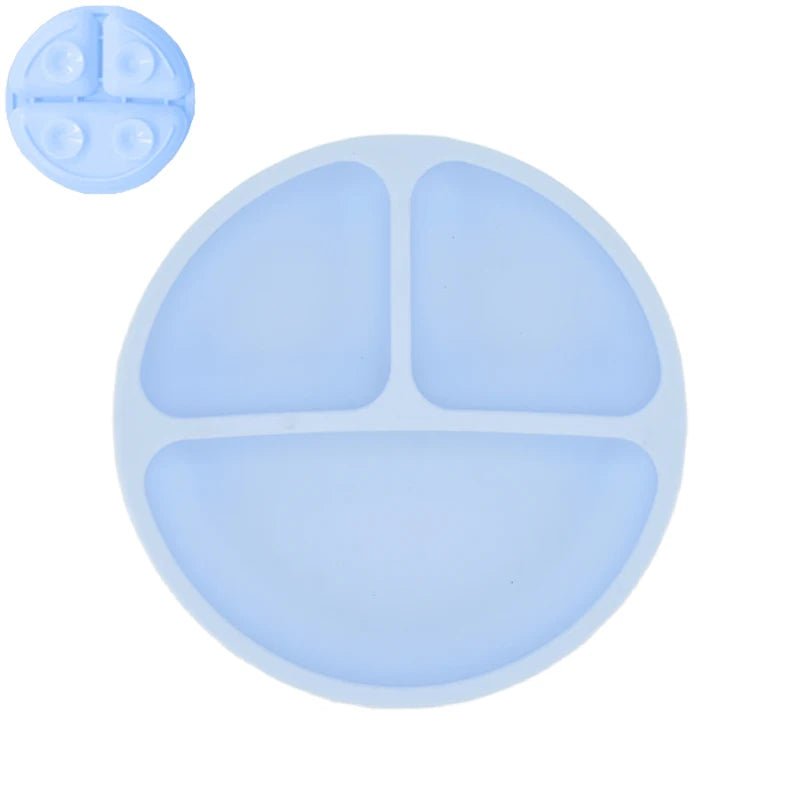 Blue silicone tray with compartments on a white background