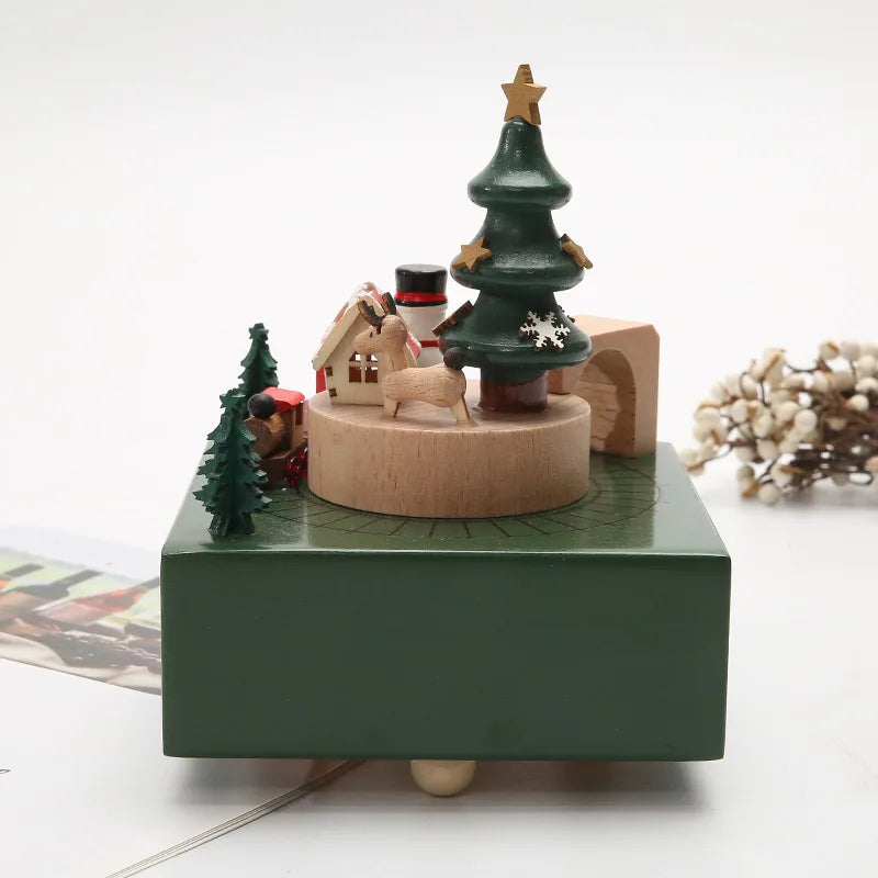 Decorative Christmas-themed music box with wooden elements on a white background