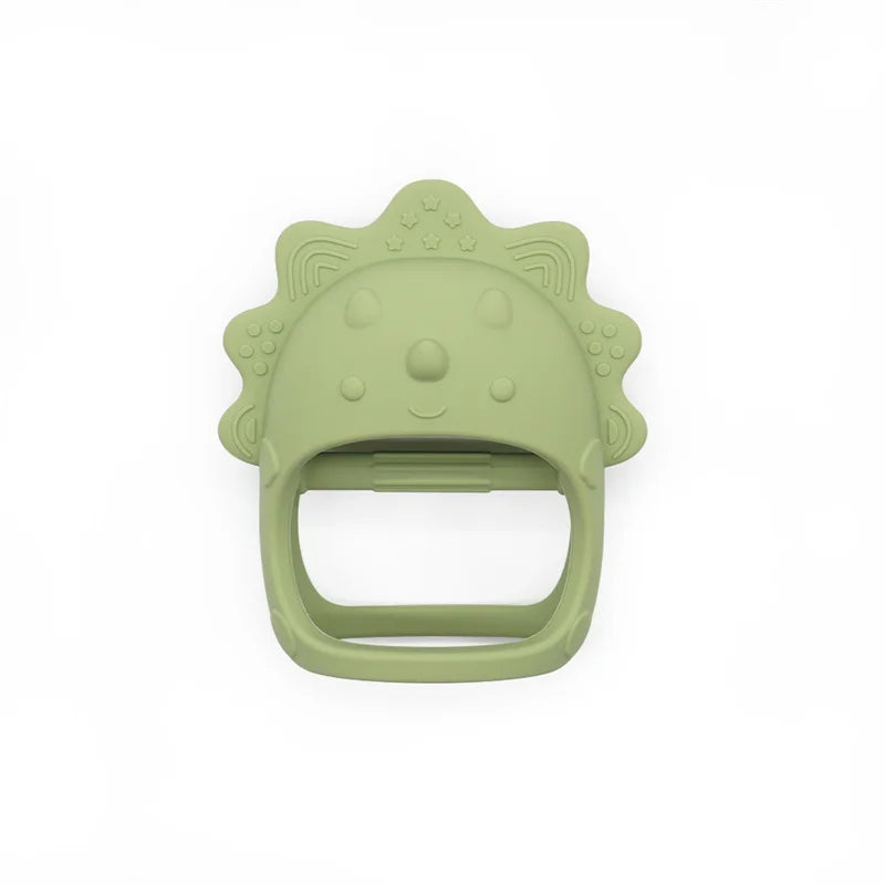 Green dinosaur-shaped teether on a white background