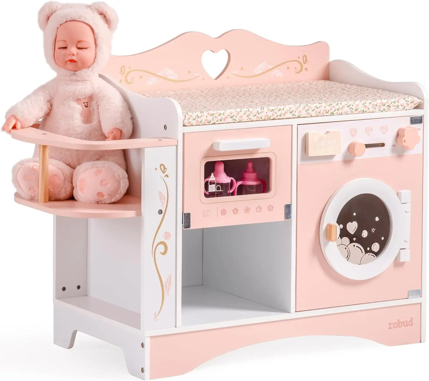 Pink toy kitchen set with a baby doll and teddy bear on a white background