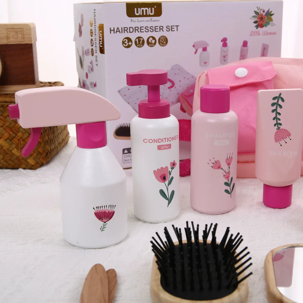 Children's hair care set with bottles, a brush, and a mirror on a white surface.