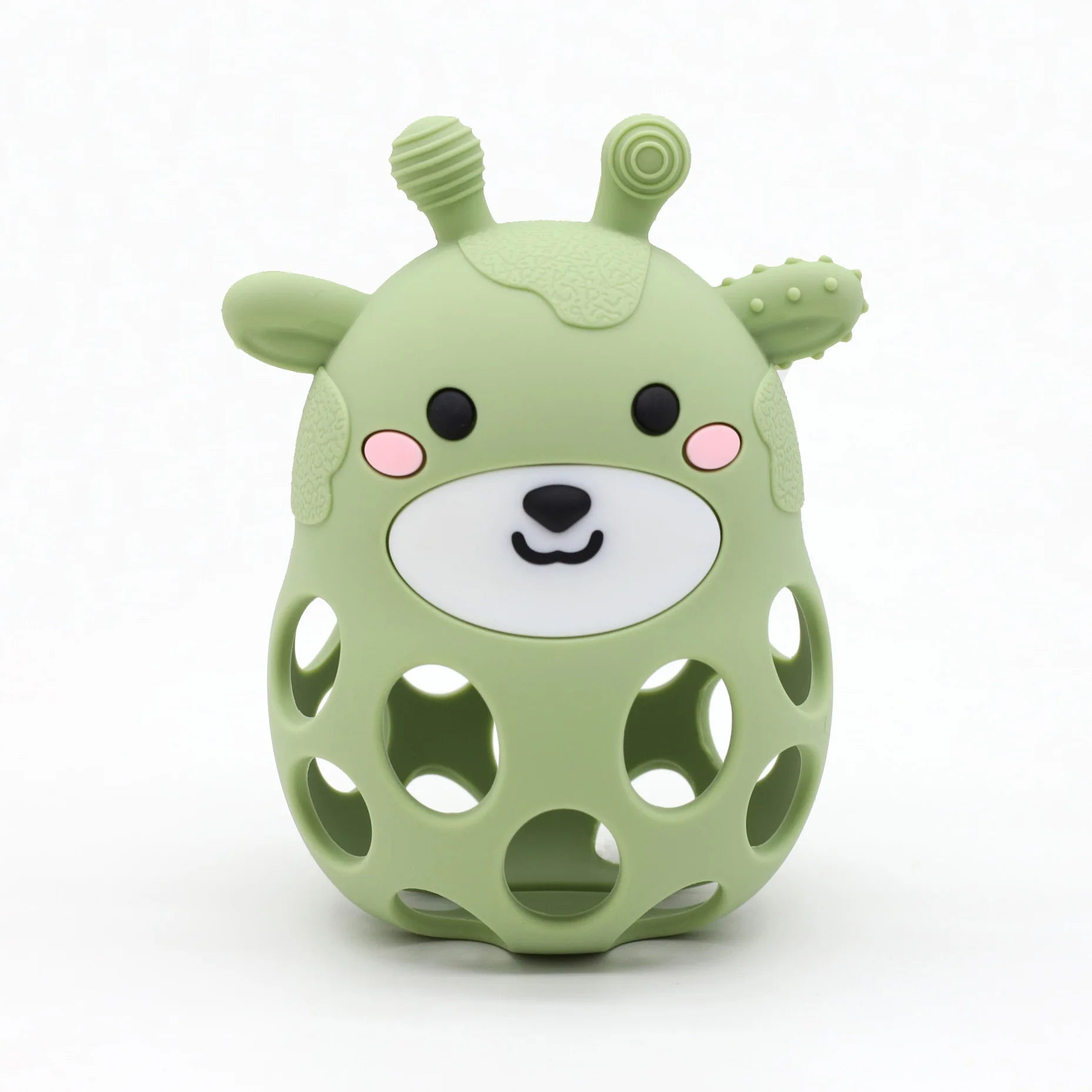 Green animal-shaped toy with a face on a white background