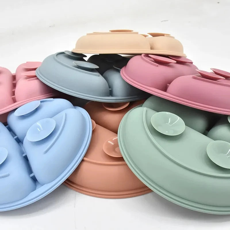 Set of colorful silicone lid covers on a white background