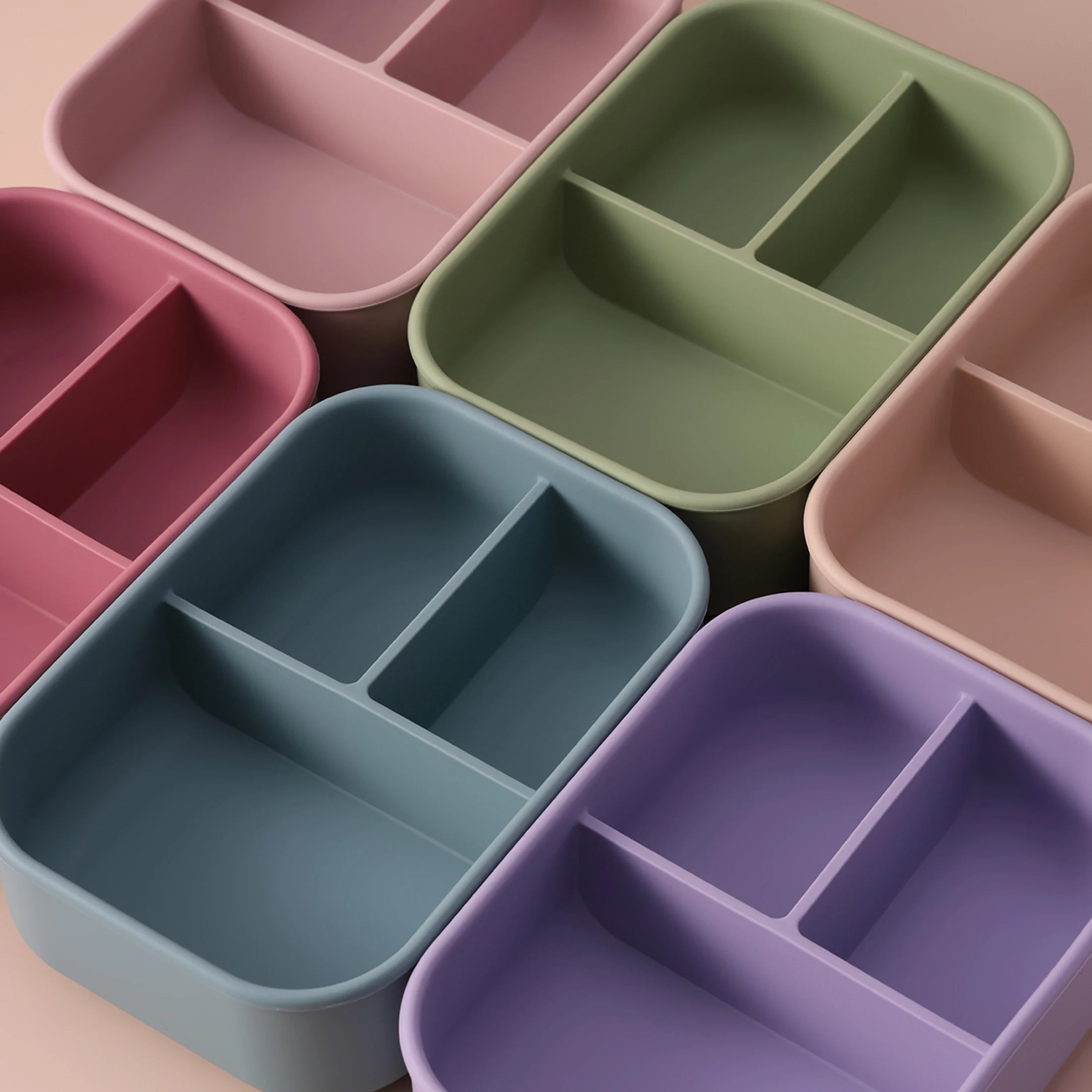 Close-up of silicone bento compartments in four colors