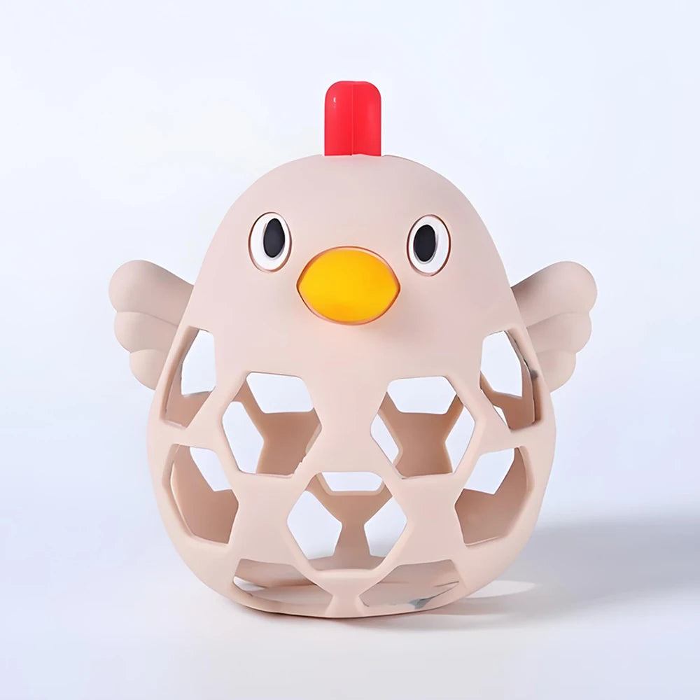 Toy shaped like a chicken with a red comb on a light gray background