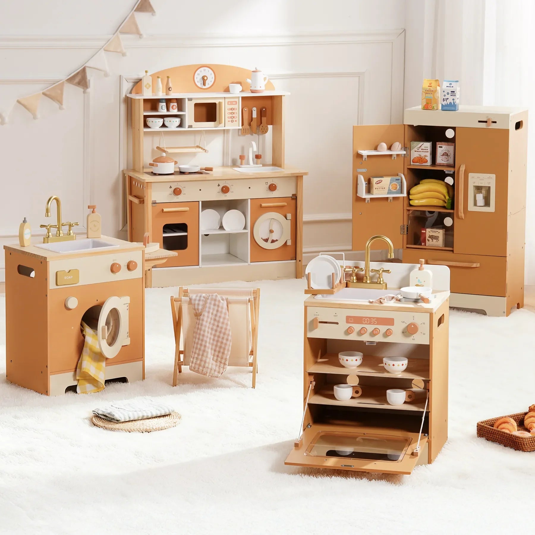 Wooden play kitchen set with various appliances and utensils on a white floor.