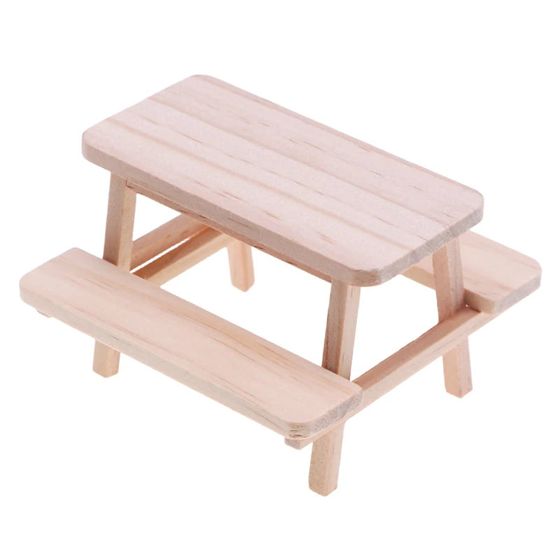 Wooden children's picnic table with bench on a white background. Oliver & Company Montessori Toys