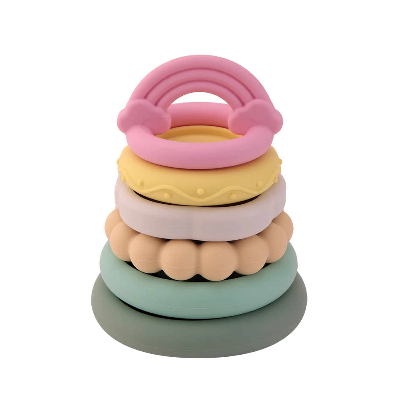 Stack of colorful baby teething rings on a white background