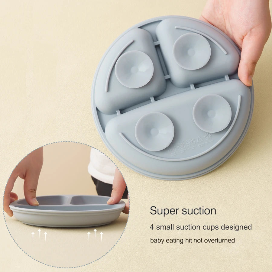 Four suction cups under the grey blue divided plate