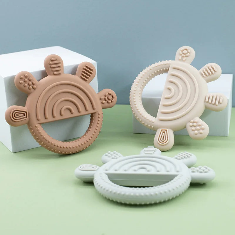Tan, cream and ice grey rainbow sun silicone teethers