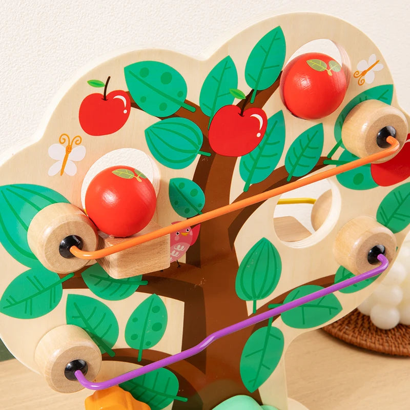 Wooden toy with apple tree design and colorful strings