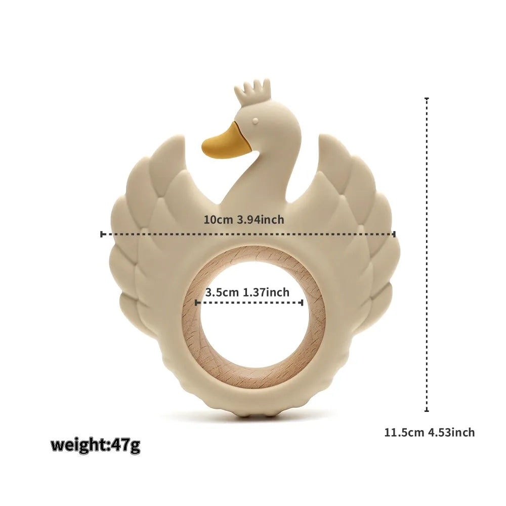 Swan-shaped teething ring with measurements and weight on a white background
