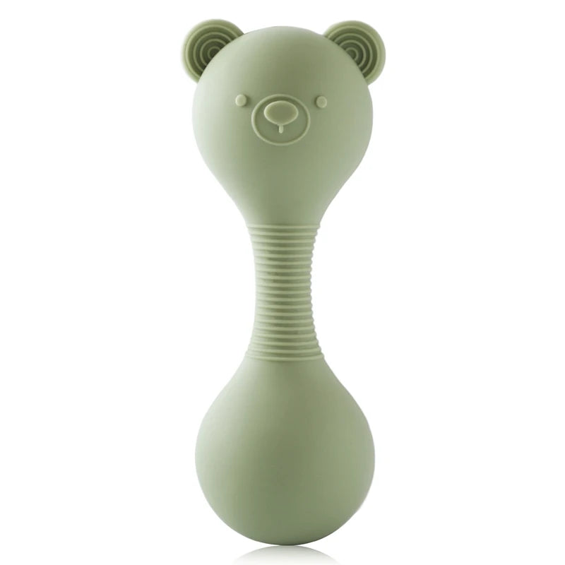 Green silicone baby rattle with bear design on a white background