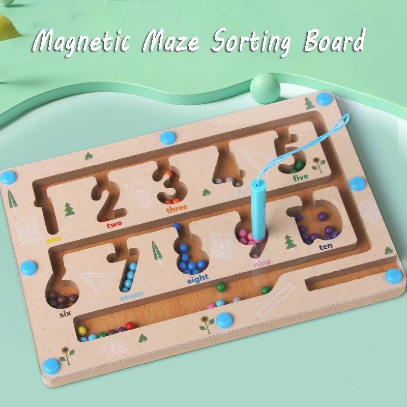 Magnetic maze sorting board with numbers and colorful beads on a light green background