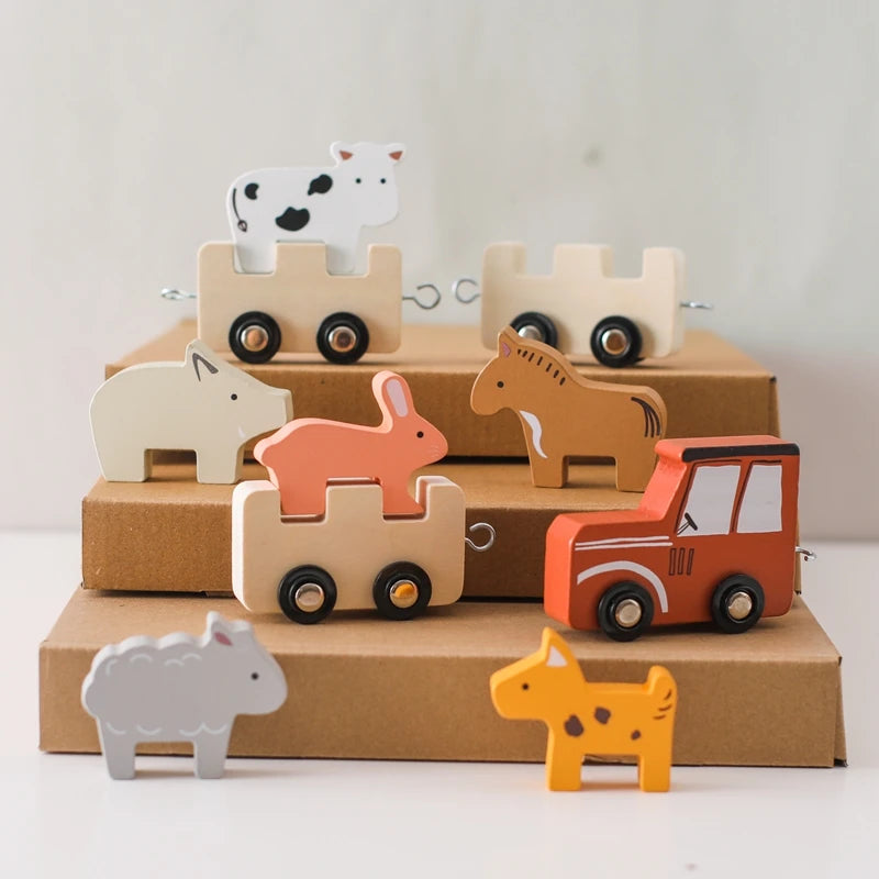 Wooden farm animals and tractor train on display steps