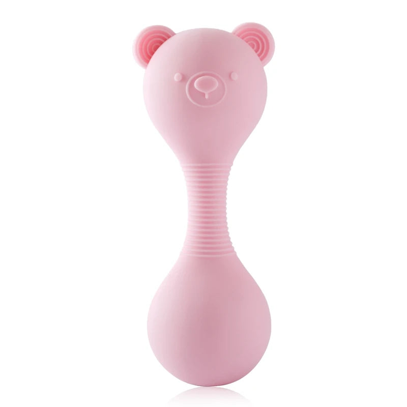 Pink bear-shaped object on a white background