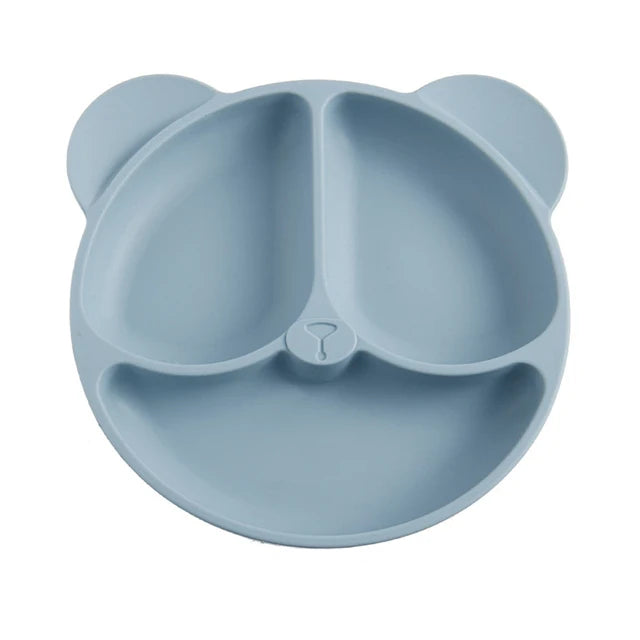 Blue silicone plate with bear ears on a white background