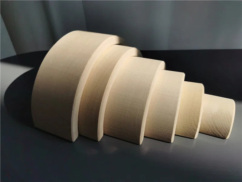 Set of natural wooden archs  on a dark surface