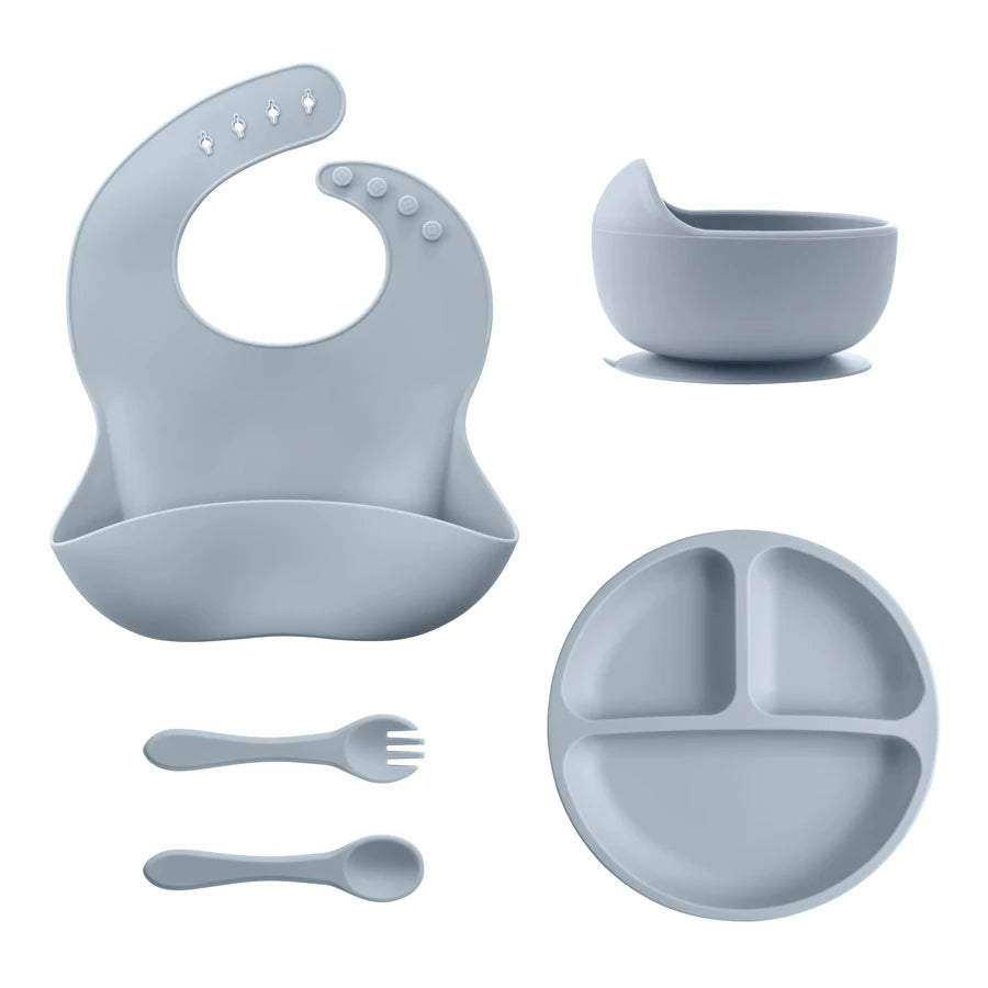 Grey blue bib, divided plate, bowl, spoon and fork