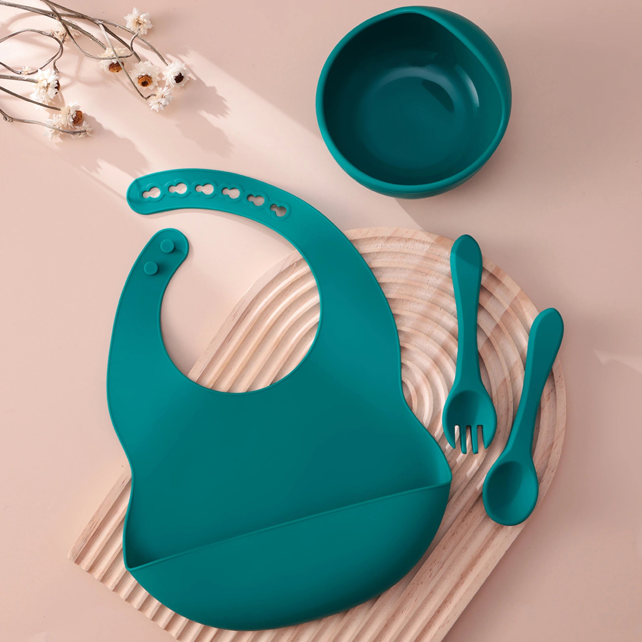 Teal bib with bowl, spoon and fork
