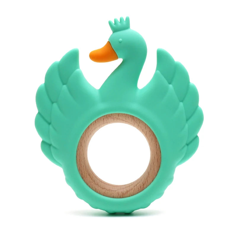 Teal swan-shaped teething ring with wooden center on a white background