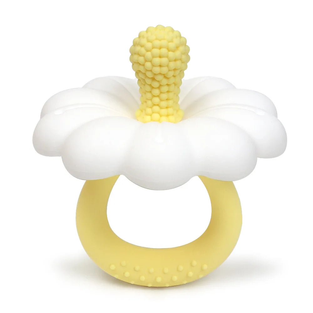 Yellow and white teething ring with a flower design on a white background