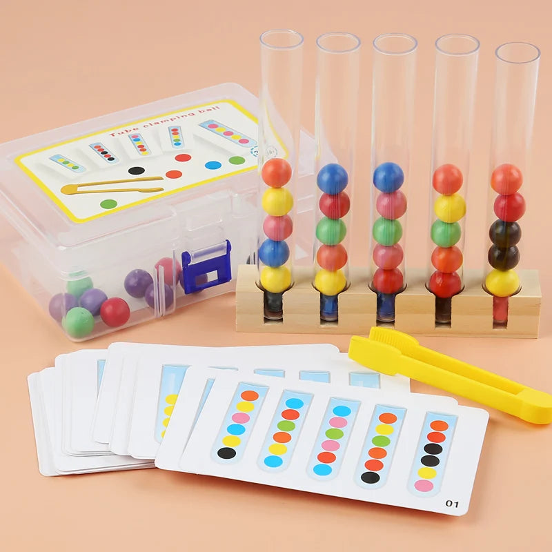Five Test Tube Clip Beads Educational Game featuring colorful balls in tubes, a plastic box with cards, and yellow tongs for enhancing motor skills and cognitive development.
