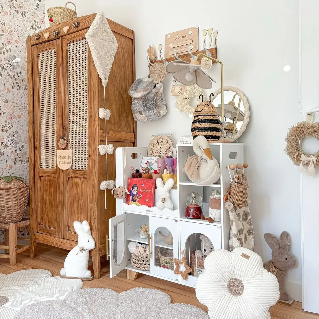 Children's bookshelf with books and toys in a room setting | Oliver Montessori Toys