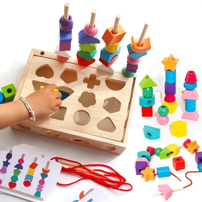 Colorful wooden shape sorting toy with a hand interacting with it on a white background.