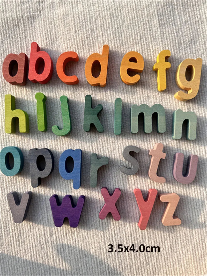 Colorful wooden letters of the alphabet on a textured surface