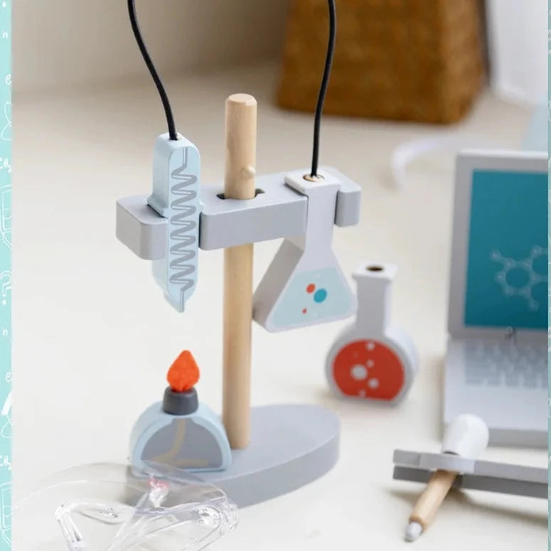 Pretend Play Microscope Set featuring a wooden microscope and experimental tools, designed to inspire young biologists through interactive and educational play.