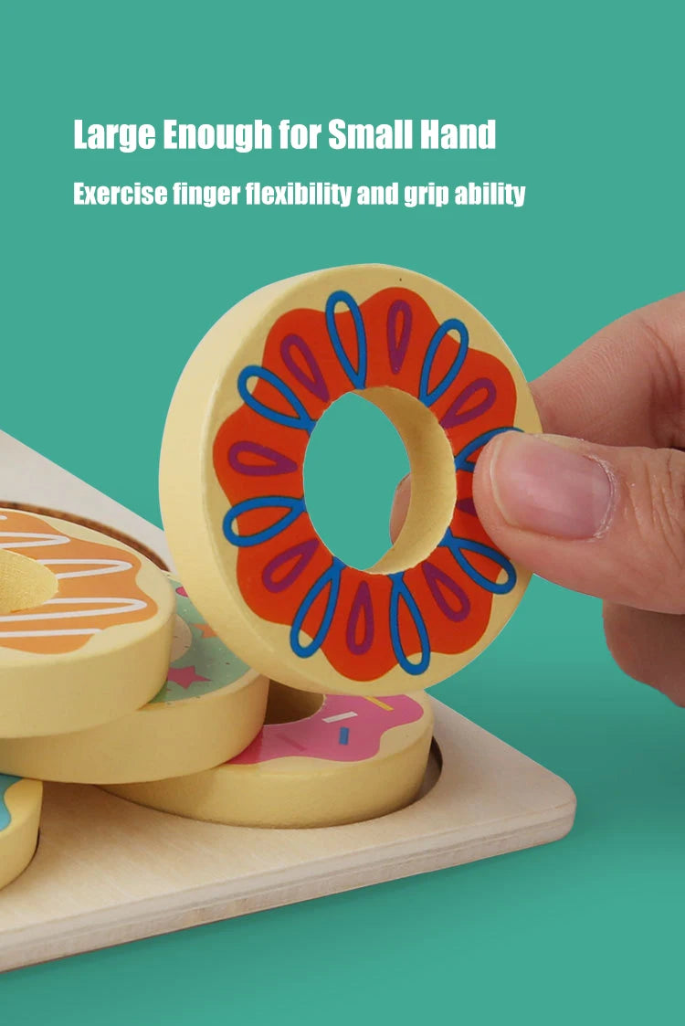 Wooden toy with colorful design on a green background