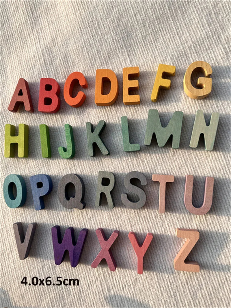Colorful wooden letters on a textured surface