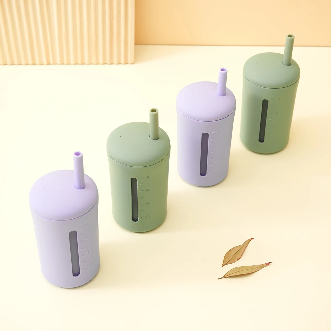 Silicone straw cups lined up in a row