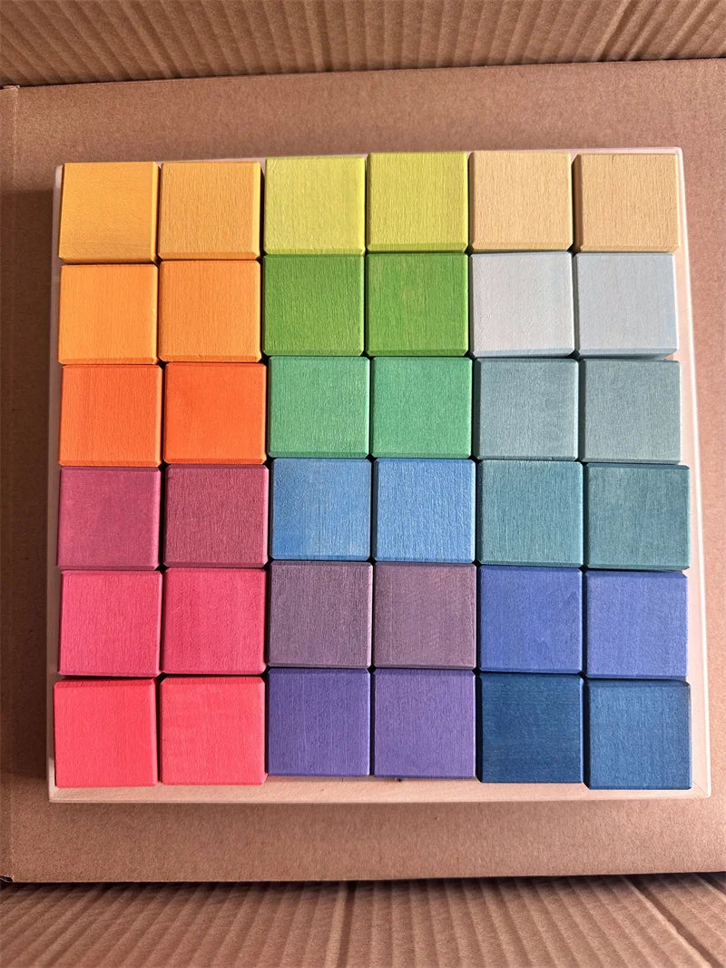 Set of colorful square blocks in a box