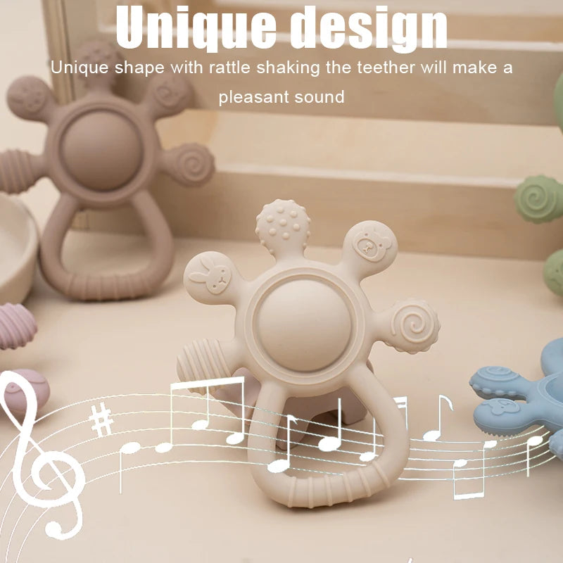 Baby teether with rattle design on a neutral background