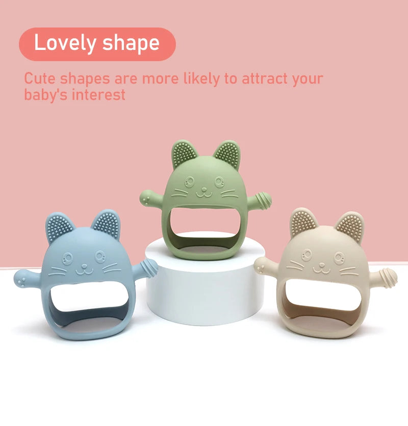 Three cat-shaped baby teething toys on a pink background with text about their cute shapes.