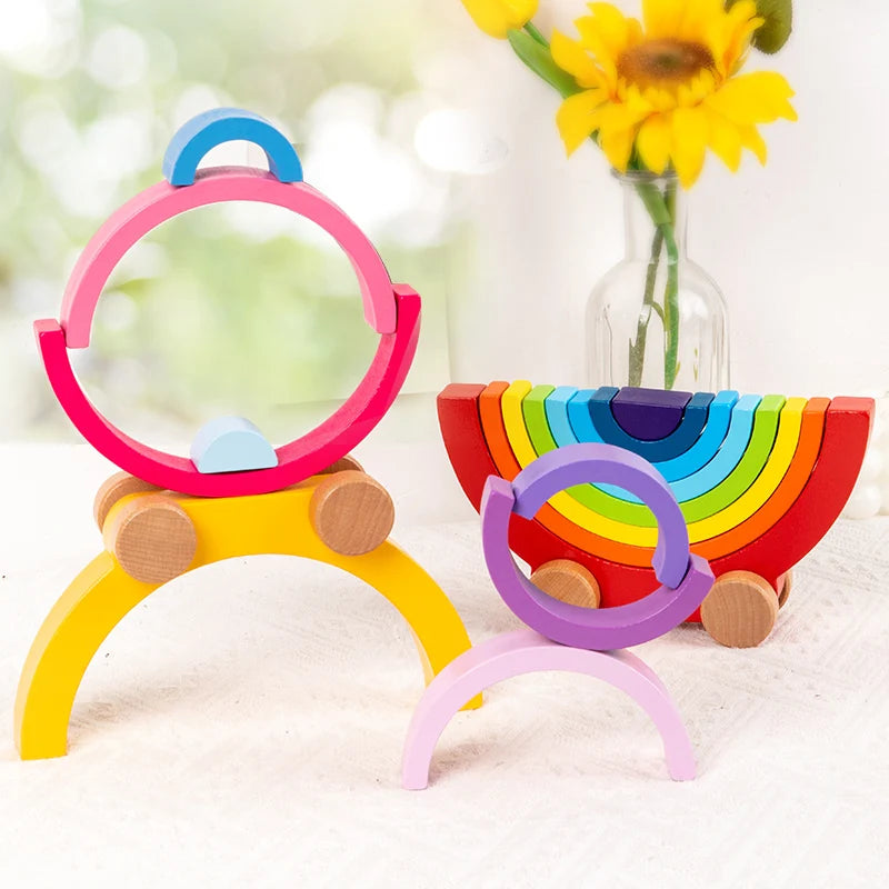 Colorful wooden toys on a white surface with a blurred background